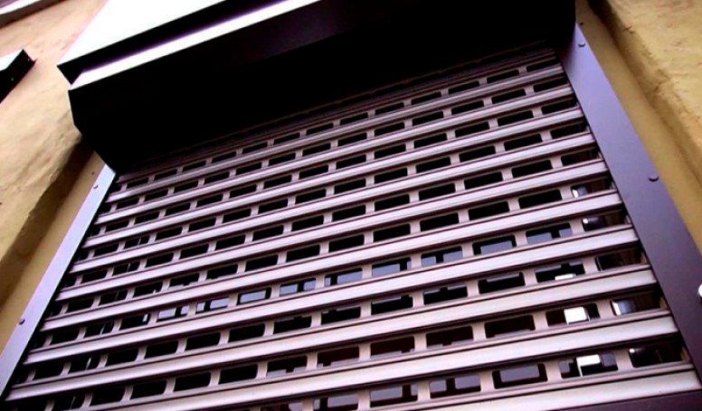 Roller shutters and gates